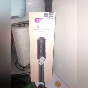 Hair straightening comb